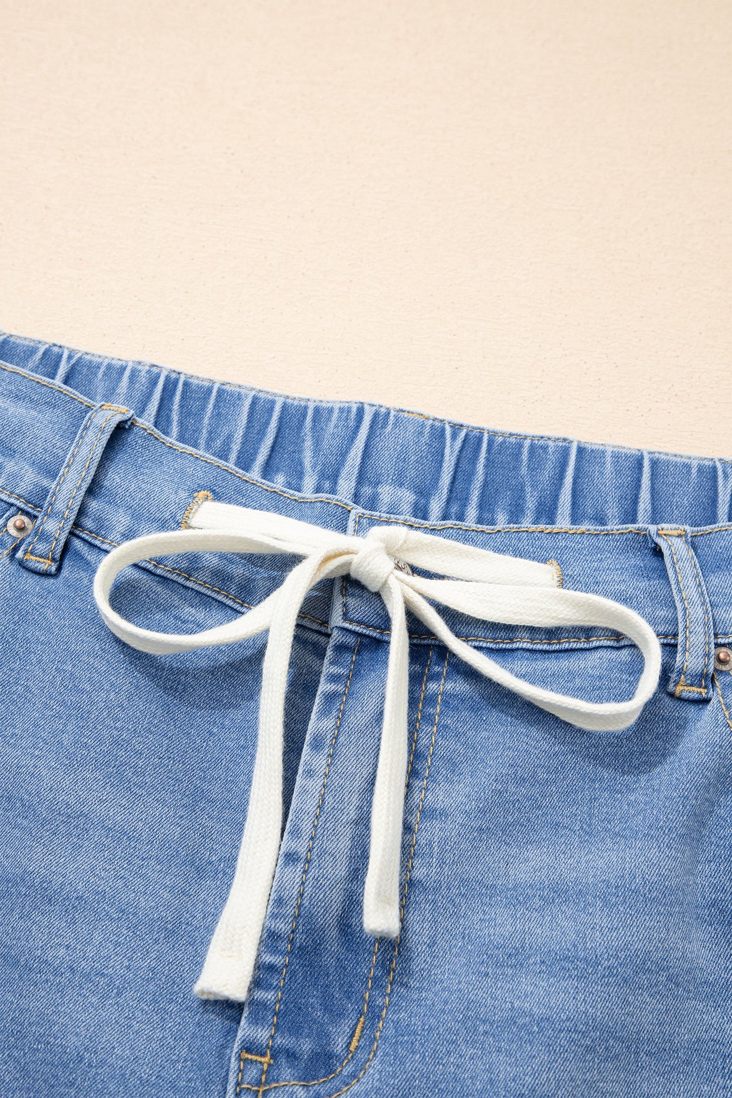 High Rise Lace Tie Whiskered Jeans