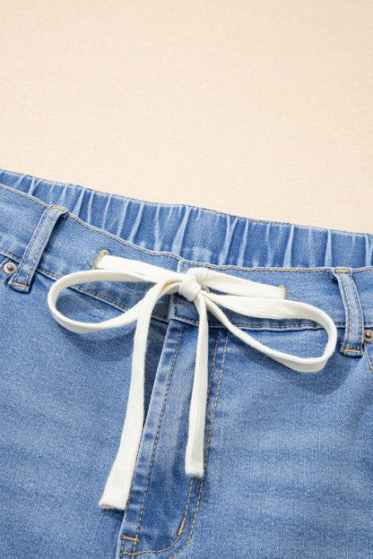 High Rise Lace Tie Whiskered Jeans